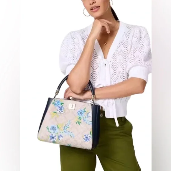 Kate Spade New York
SPADE FLOWER FLORAL MEDIUM TOP HANDLE SATCHEL - Picture 2 of 6